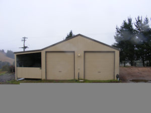 custom brown shed with 2 doors